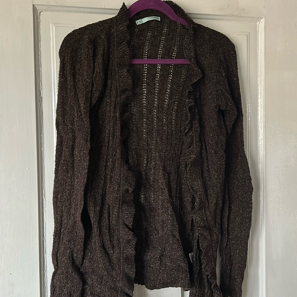 Maurice’s brown light cardigan with frilly edges